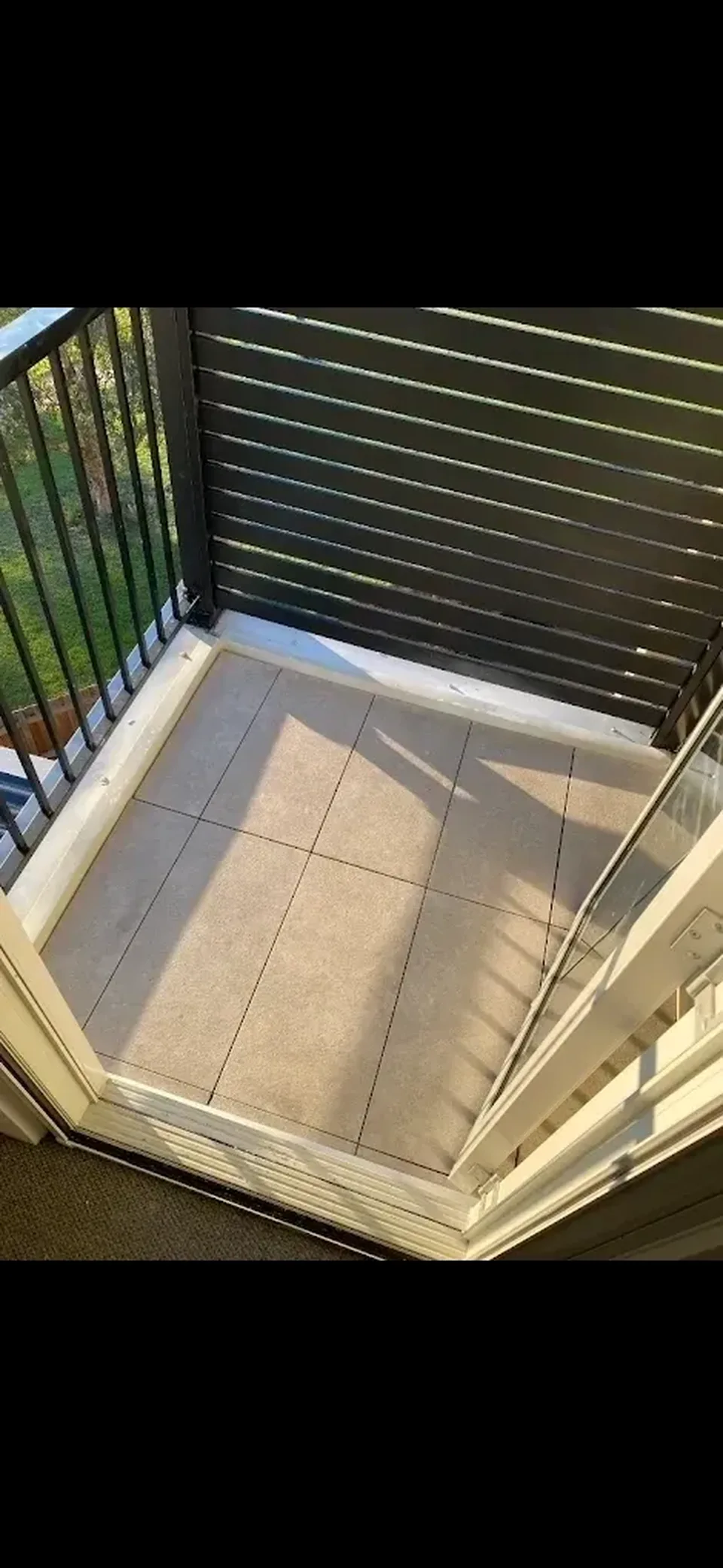 Finished tiled balcony with privacy screening